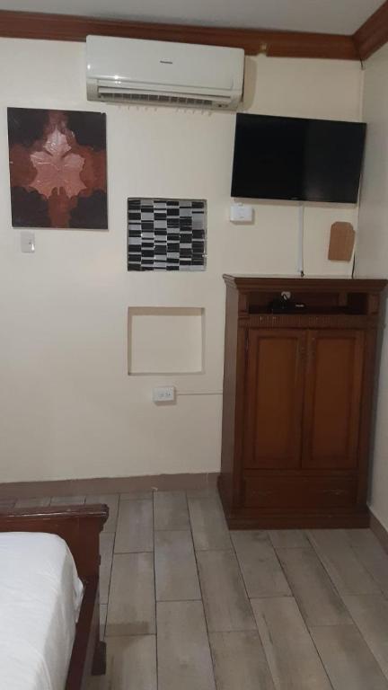 TV a/nebo společenská místnost v ubytování Hotel Fika Guayaquil