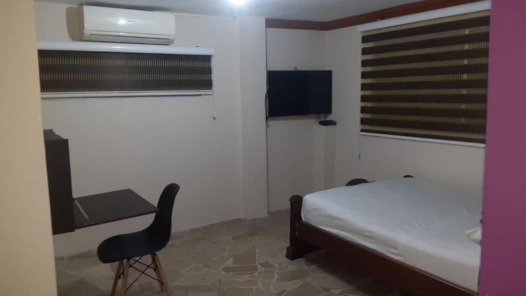 TV a/nebo společenská místnost v ubytování Hotel Fika Guayaquil