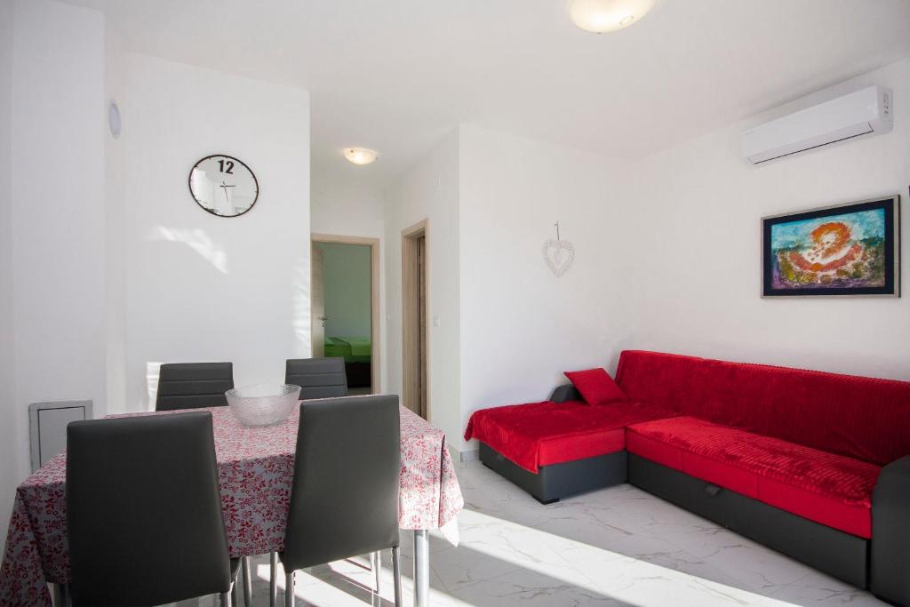 Posedenie v ubytovaní Apartments Osti