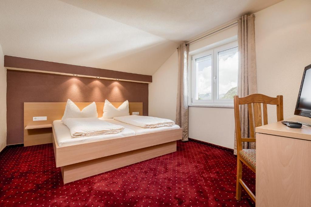 Postel nebo postele na pokoji v ubytování Haus Isabella Apartments - Oetz
