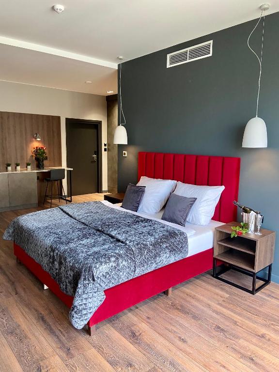 Postel nebo postele na pokoji v ubytování Aparts Hotel Radom