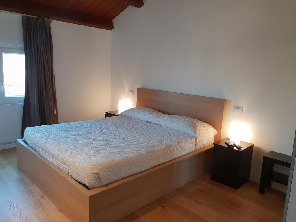 Postel nebo postele na pokoji v ubytování Terrazze Caracciolo