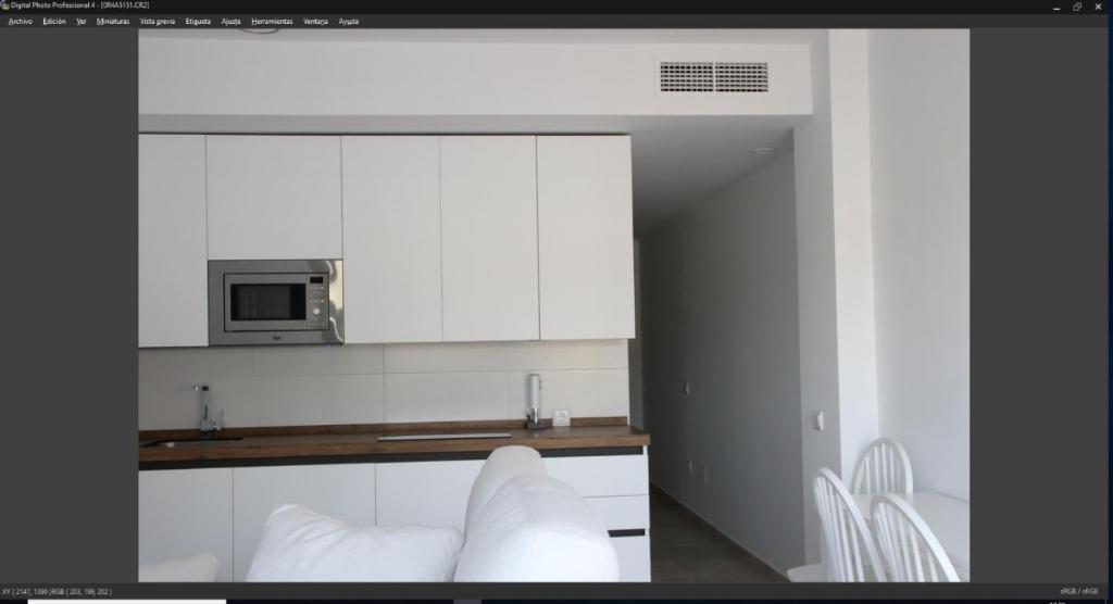 Kuchyň nebo kuchyňský kout v ubytování Apartamentos Cachón