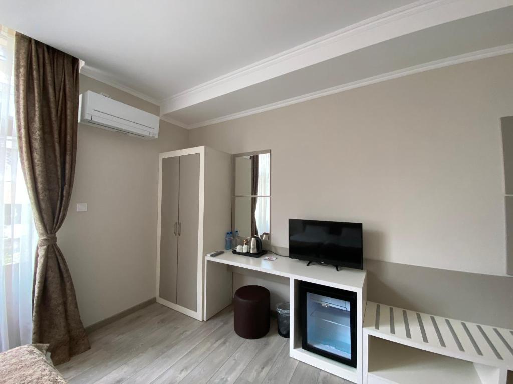 Comfort Guest Rooms - Habitación Triple Estándar