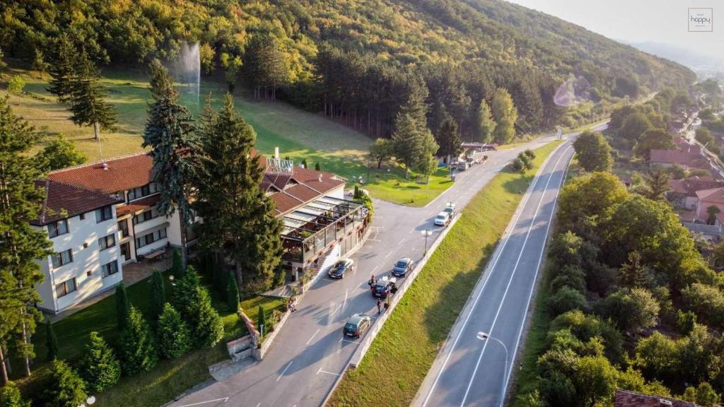 an aerial view of a road in a mountain at Hotel Happy in Dimitrovgrad