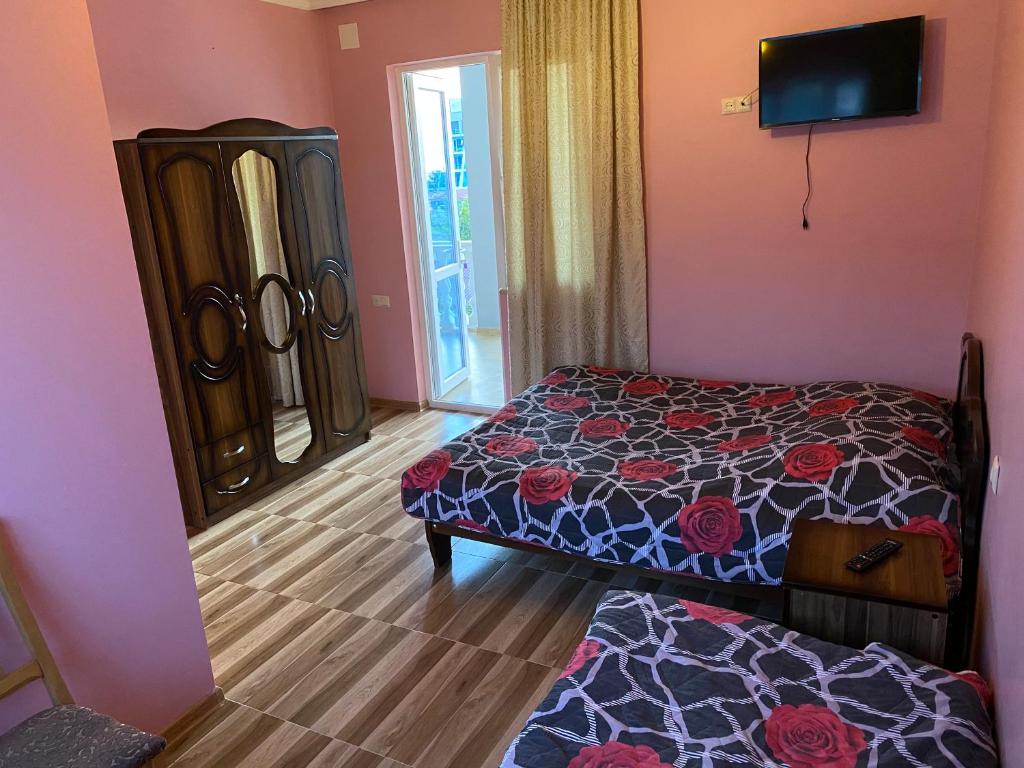 Postel nebo postele na pokoji v ubytování Beliy Dom