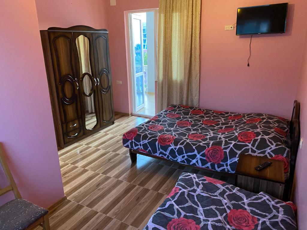 Postel nebo postele na pokoji v ubytování Beliy Dom