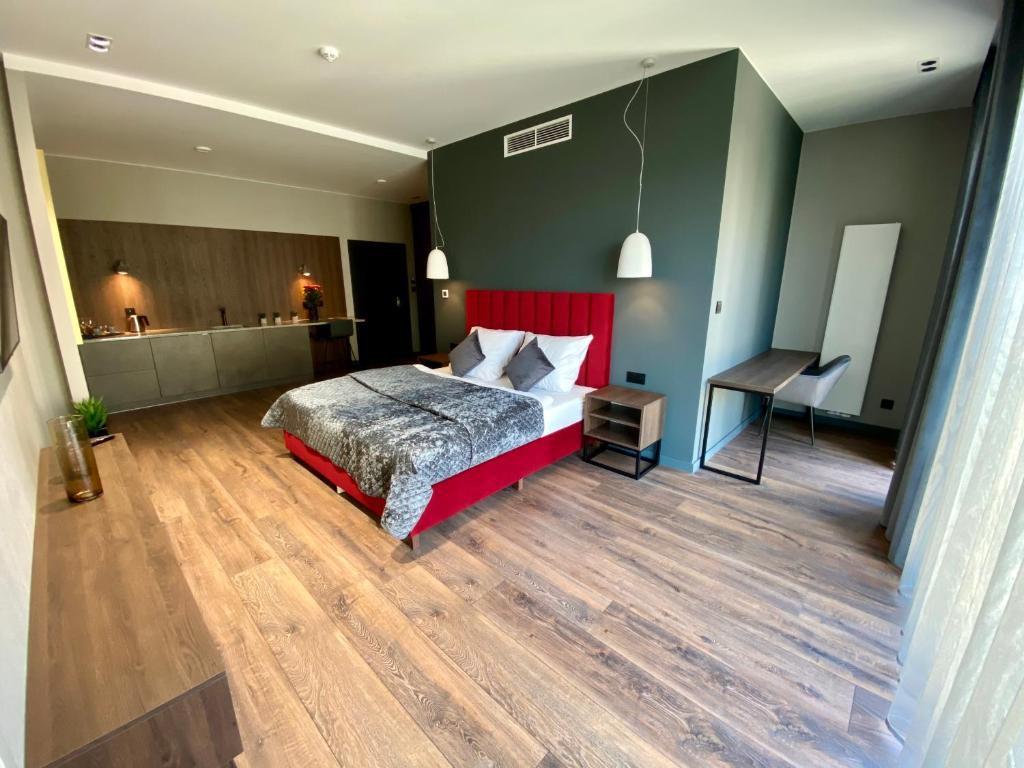 Postel nebo postele na pokoji v ubytování Aparts Hotel Radom