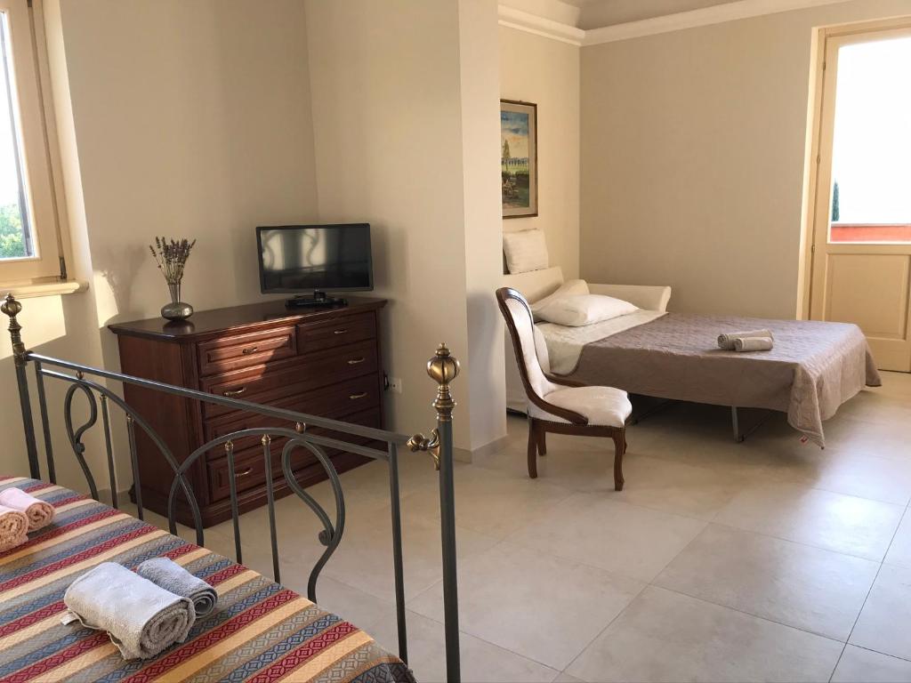 Łóżko lub łóżka w pokoju w obiekcie B&B Bee