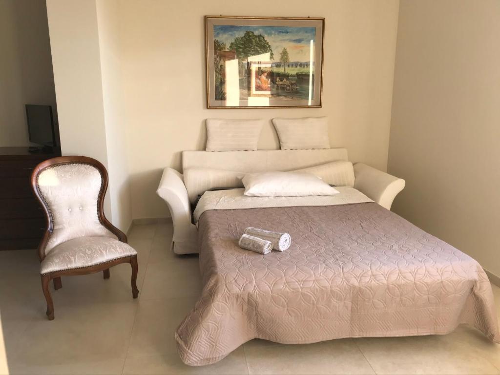 Łóżko lub łóżka w pokoju w obiekcie B&B Bee