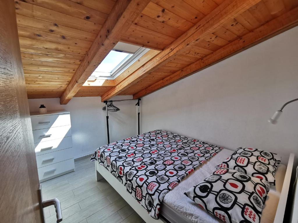 Posteľ alebo postele v izbe v ubytovaní Bugenvila