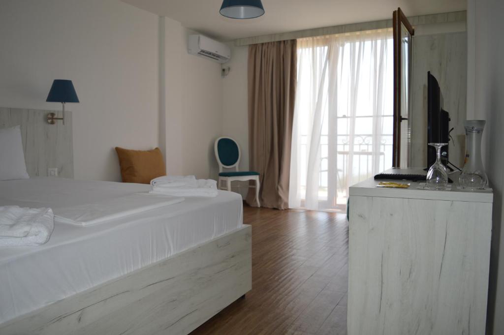 Postel nebo postele na pokoji v ubytování Hotel La Terrazza