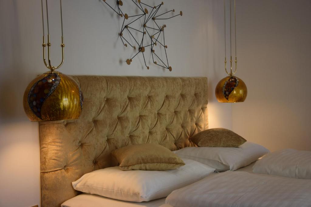 Postel nebo postele na pokoji v ubytování Hotel Torwirt