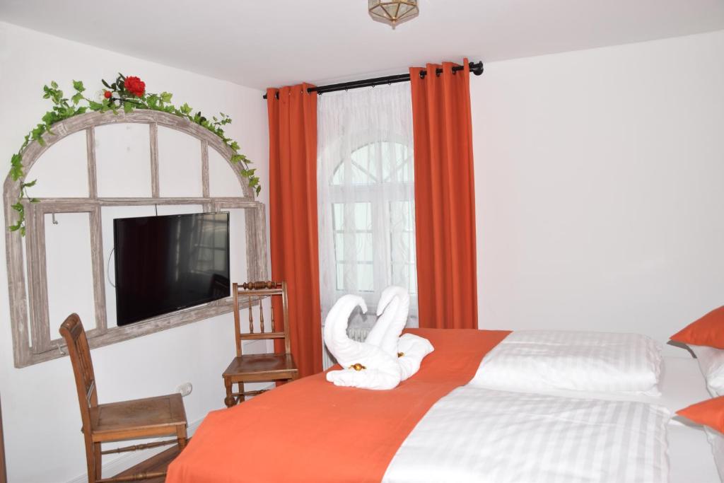 Postel nebo postele na pokoji v ubytování Hotel Torwirt