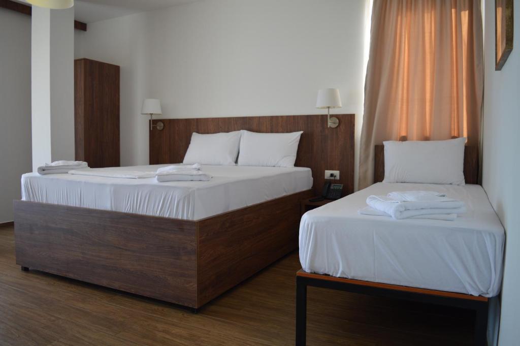 Postel nebo postele na pokoji v ubytování Hotel La Terrazza
