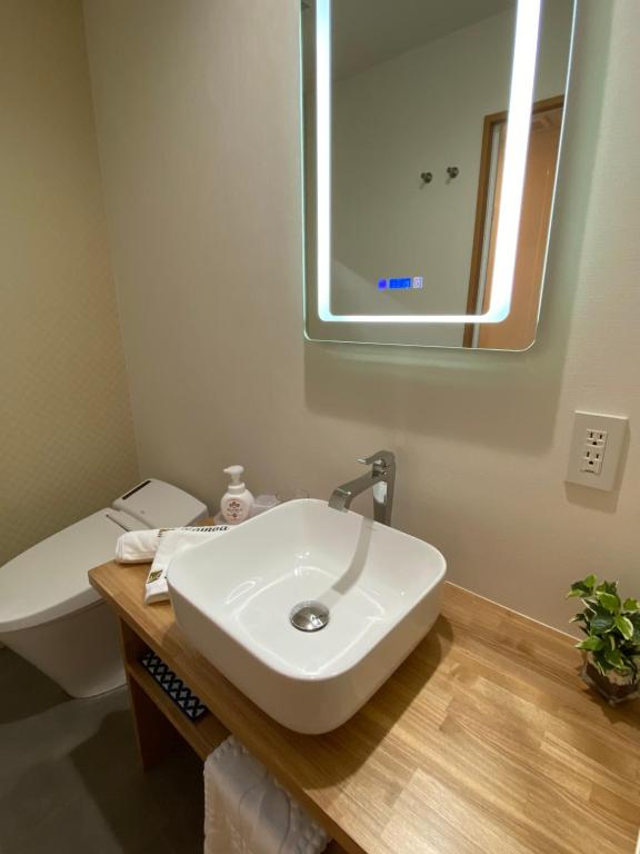Koupelna v ubytování Kainoa Guesthouse