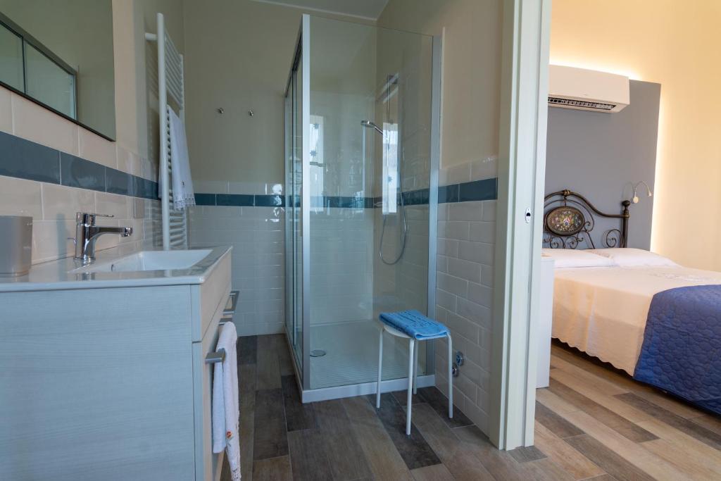 Łóżko lub łóżka w pokoju w obiekcie B&b IL CERE