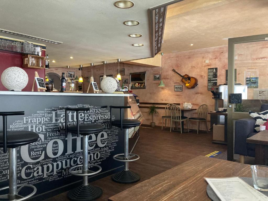 Lounge nebo bar v ubytování Pension Boulevard