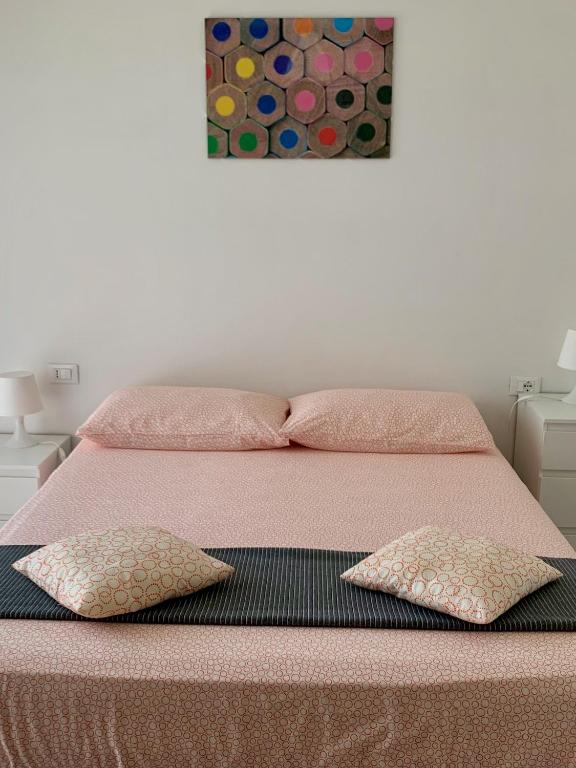 Posteľ alebo postele v izbe v ubytovaní Ennodio Apartment