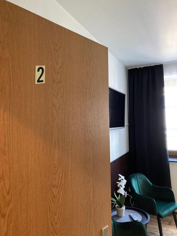 TV a/nebo společenská místnost v ubytování Pension Boulevard