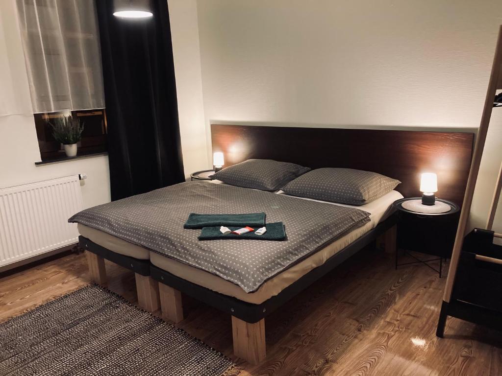 Postel nebo postele na pokoji v ubytování Pension Boulevard