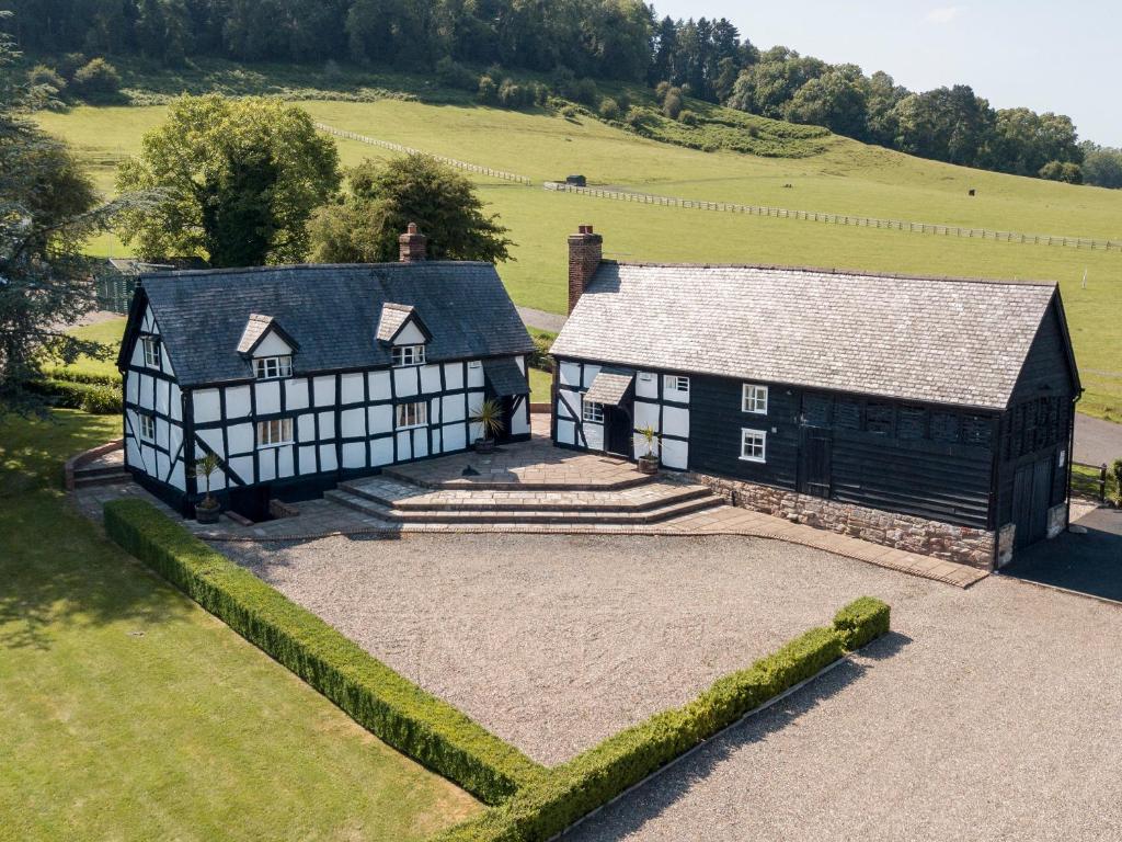 an aerial view of a house and a barn at Campbell in Worcester