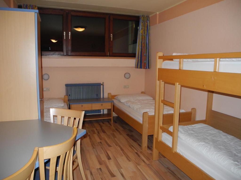 Postel nebo postele na pokoji v ubytování Jutel Obertraun