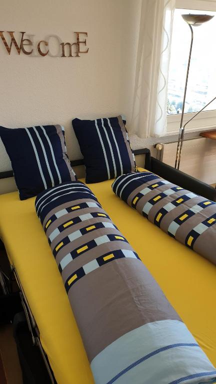 Postel nebo postele na pokoji v ubytování Ferienwohnung Seesicht