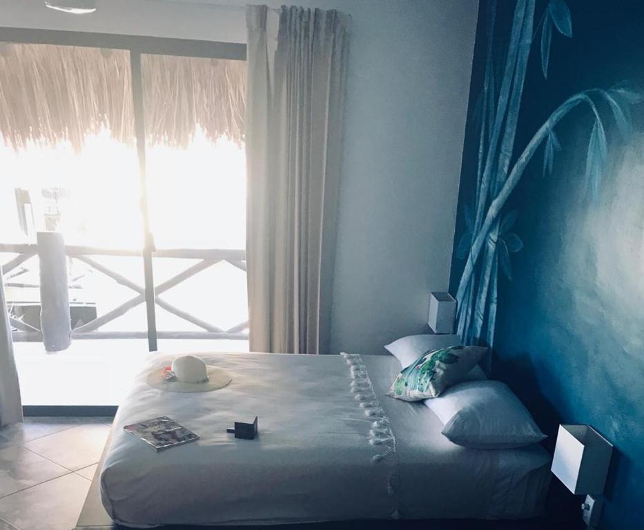 Postel nebo postele na pokoji v ubytování Hotel Luna De Plata