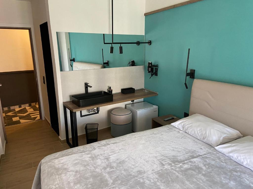 Łóżko lub łóżka w pokoju w obiekcie Park Hotel