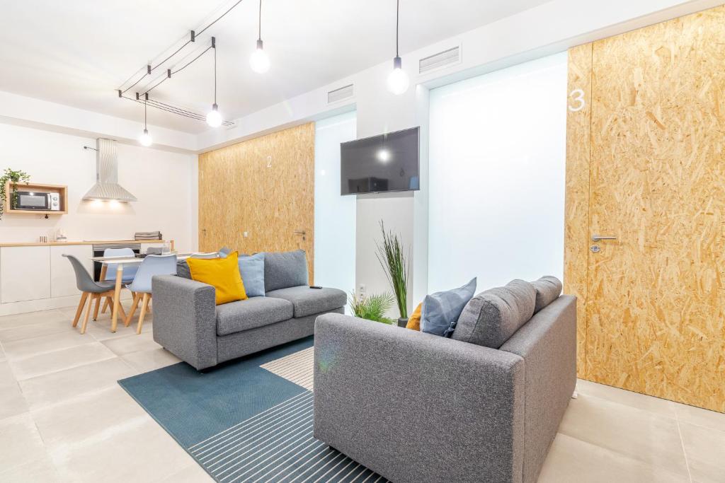 Posezení v ubytování Flatguest Paez Suites