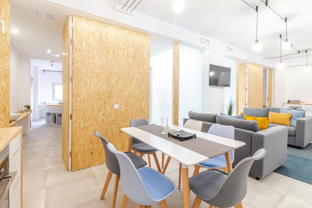 TV a/nebo společenská místnost v ubytování Flatguest Paez Suites