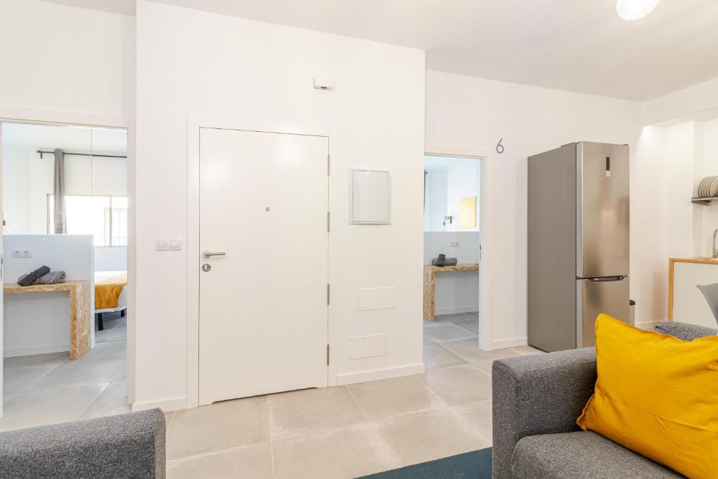 Kuchyň nebo kuchyňský kout v ubytování Flatguest Paez Suites