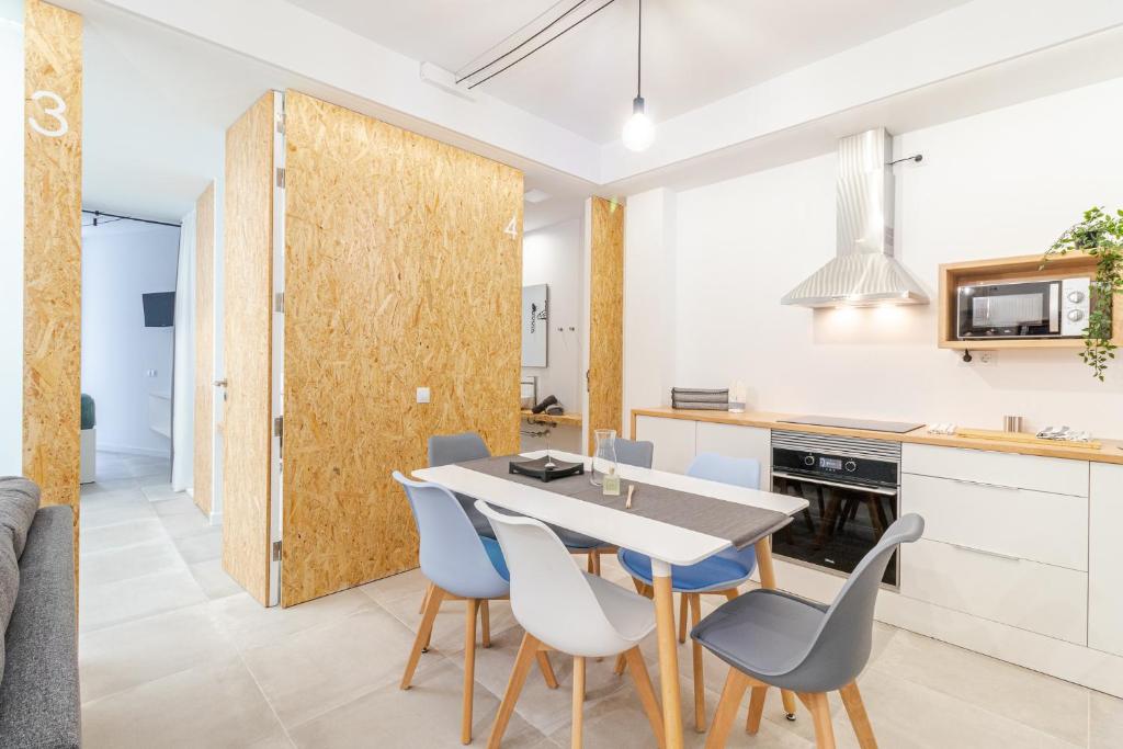 Kuchyň nebo kuchyňský kout v ubytování Flatguest Paez Suites