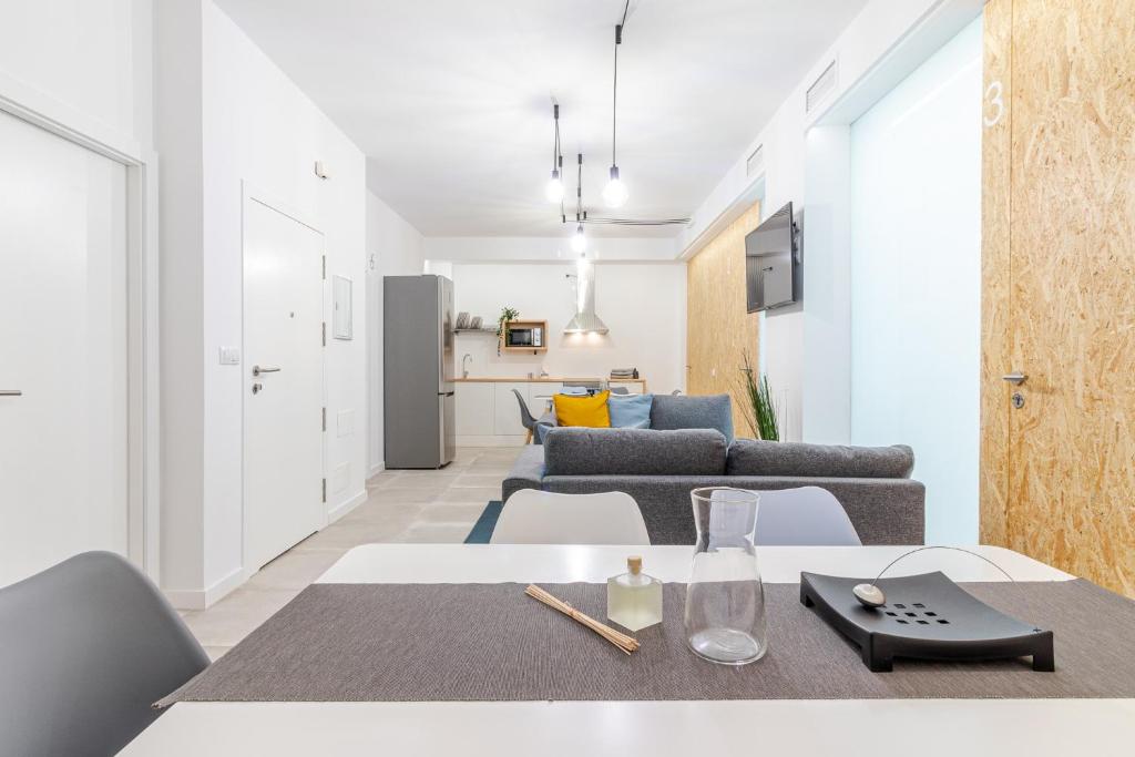 Posezení v ubytování Flatguest Paez Suites
