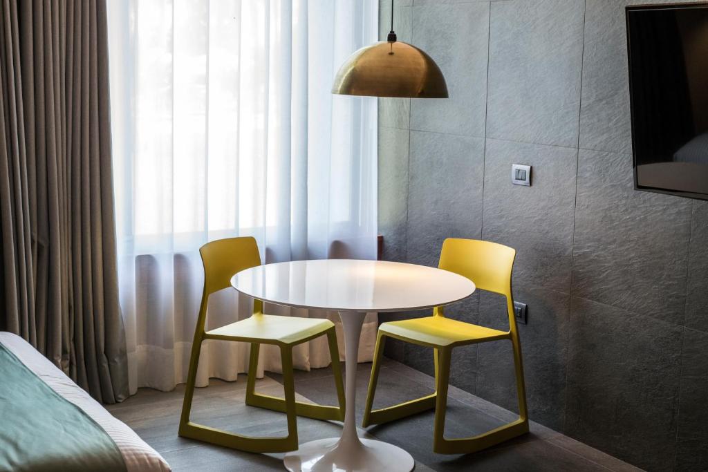 TV a/nebo společenská místnost v ubytování Hotel Y Parque Acuático La Caldera