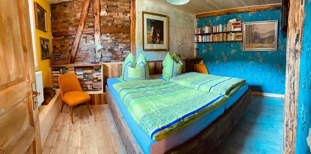 Postel nebo postele na pokoji v ubytování Vintage Home 55 Direkt am Fuße zur Wartburg