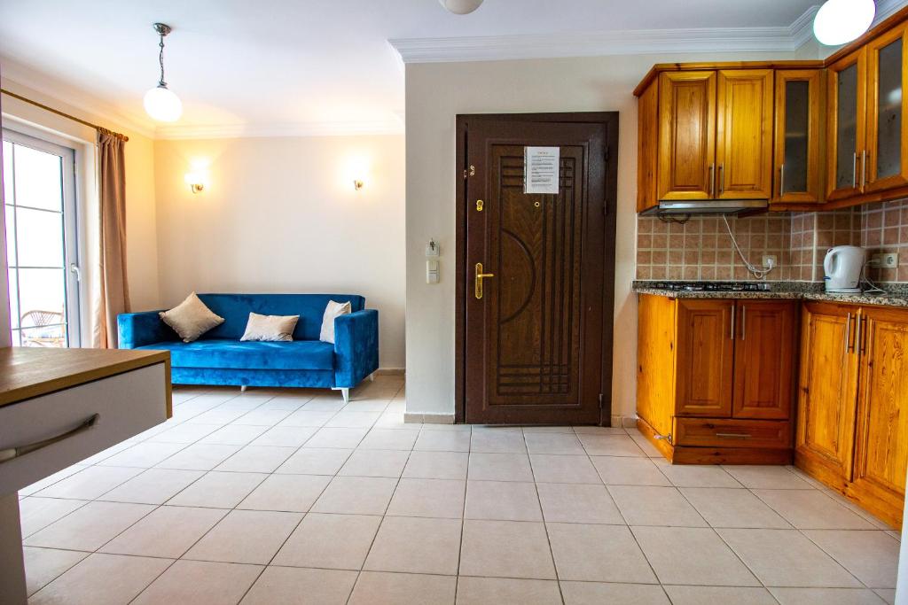 Kuchyň nebo kuchyňský kout v ubytování Tayfun Apart Hotel