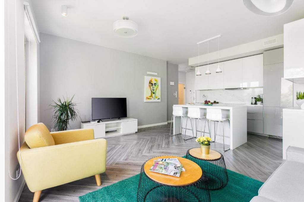 Televízia a/alebo spoločenská miestnosť v ubytovaní MY KRAKOW Apartments - Rakowicka