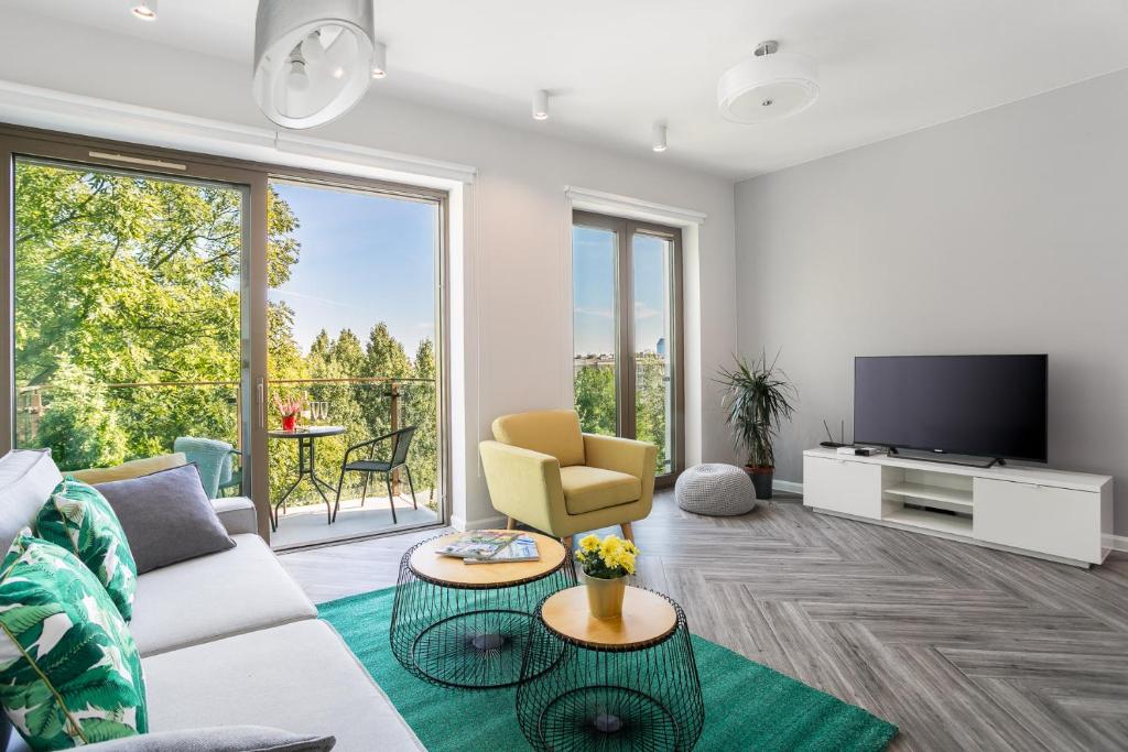 Televízia a/alebo spoločenská miestnosť v ubytovaní MY KRAKOW Apartments - Rakowicka
