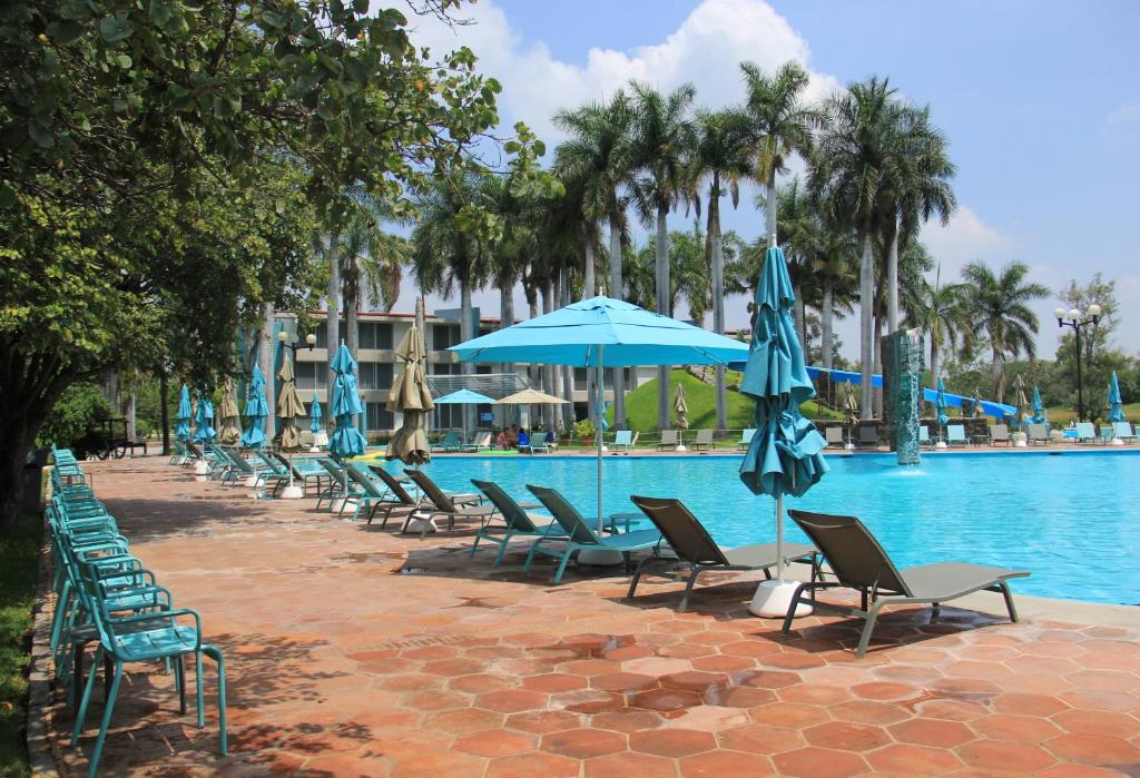 Bazén v ubytování Hotel Y Parque Acuático La Caldera nebo v jeho okolí
