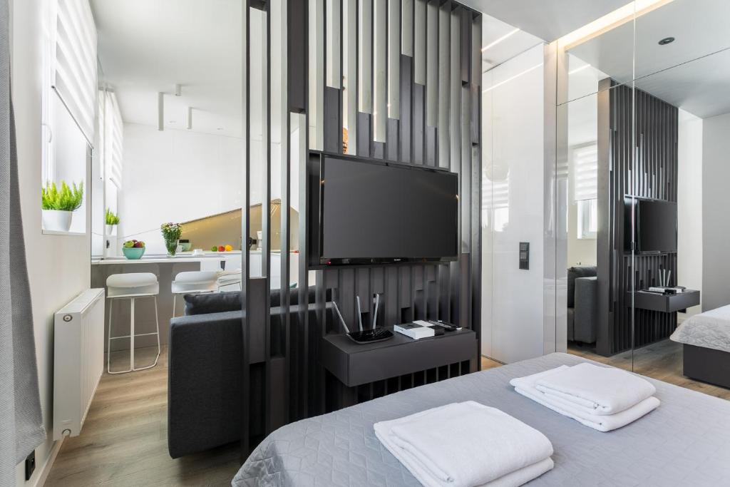 Posteľ alebo postele v izbe v ubytovaní MY KRAKOW Apartments - Rakowicka
