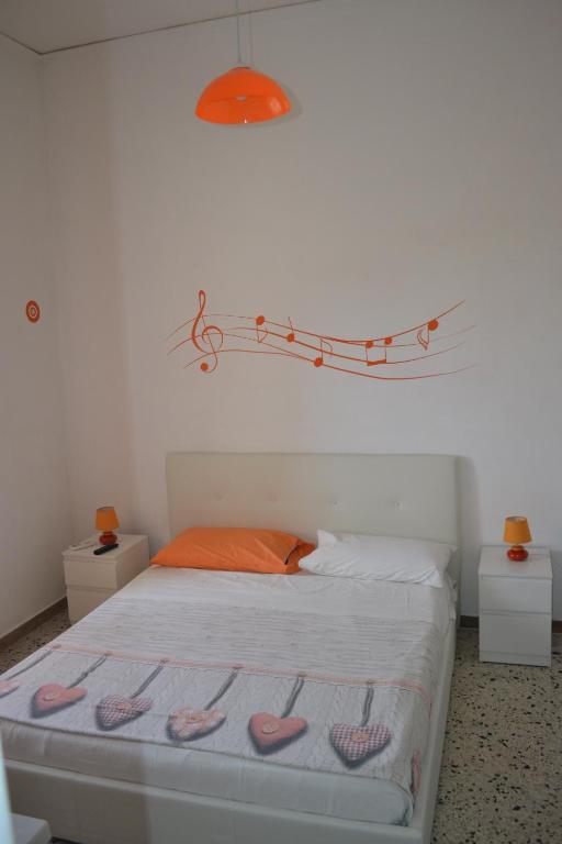 Postel nebo postele na pokoji v ubytování Sorrento Experience