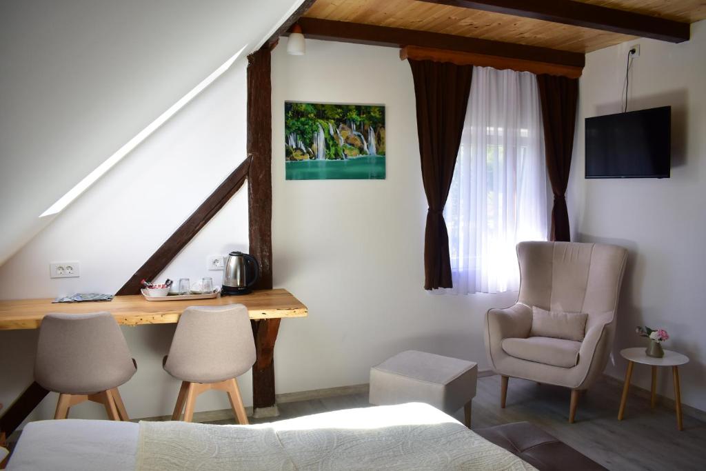TV a/nebo společenská místnost v ubytování House Boro