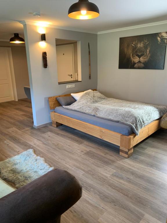 Postel nebo postele na pokoji v ubytování African Suite - Maintal bei Frankfurt