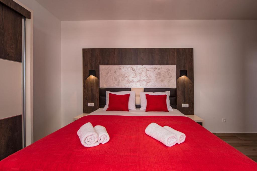 Postel nebo postele na pokoji v ubytování David Lux beach rooms