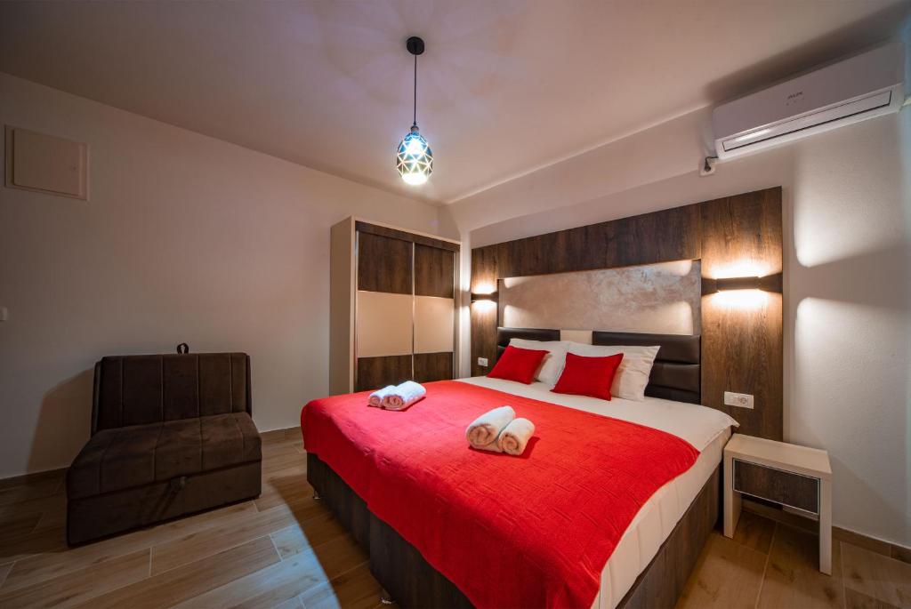 Postel nebo postele na pokoji v ubytování David Lux beach rooms