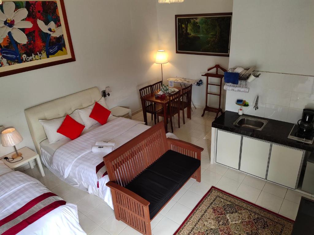 Postel nebo postele na pokoji v ubytování Kurau Inn Farmstay