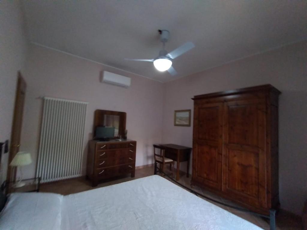 Postel nebo postele na pokoji v ubytování B&B L'Oliveto