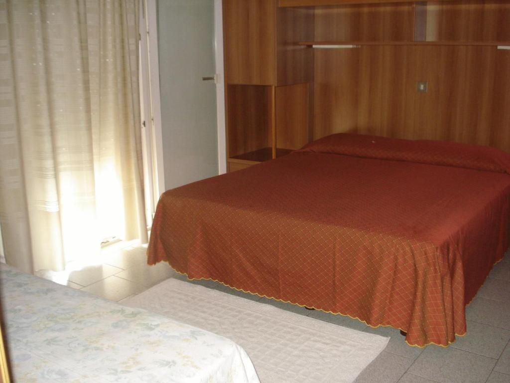 Postel nebo postele na pokoji v ubytování Hotel Roby